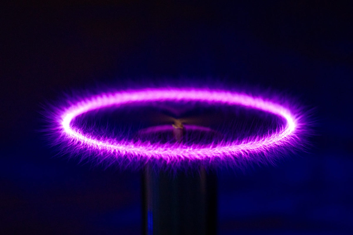 Purple circular light effect from Quantaphi antenna on a dark background